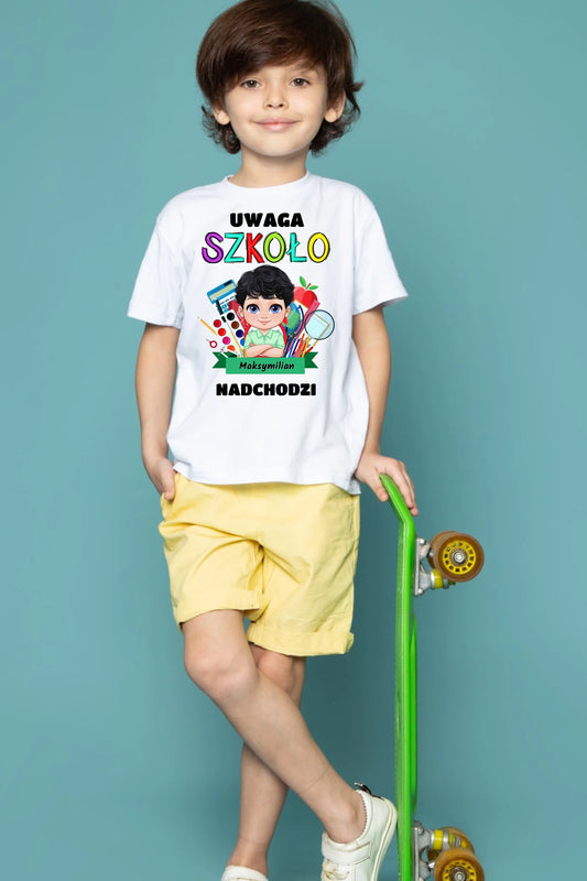 front-view-cute-child-boy-white-t-shirt-yellow-jeans-holding-green-skateboard-blue-floor